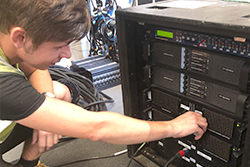 Davis adjusting an amp rack